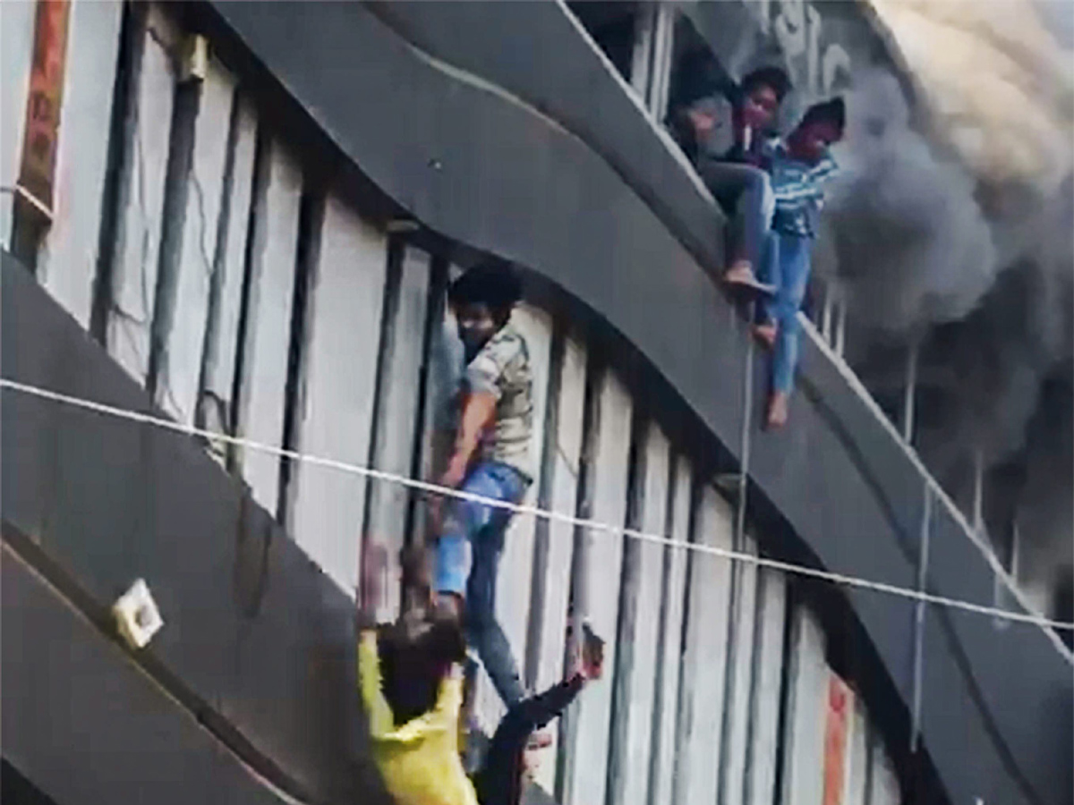 Fire Accident Taxshila Complex in Surat Photo Gallery - Sakshi1