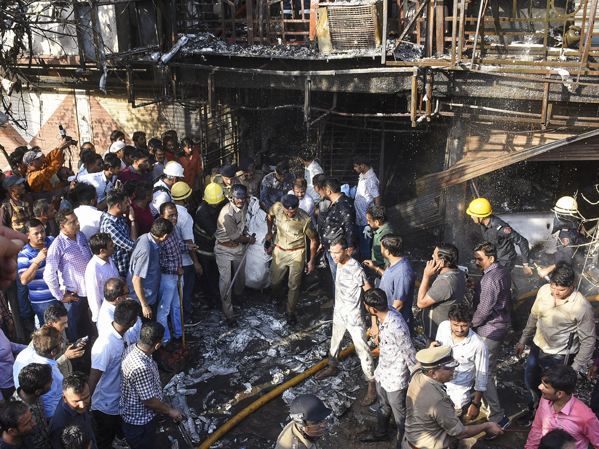 Fire Accident Taxshila Complex in Surat Photo Gallery - Sakshi10