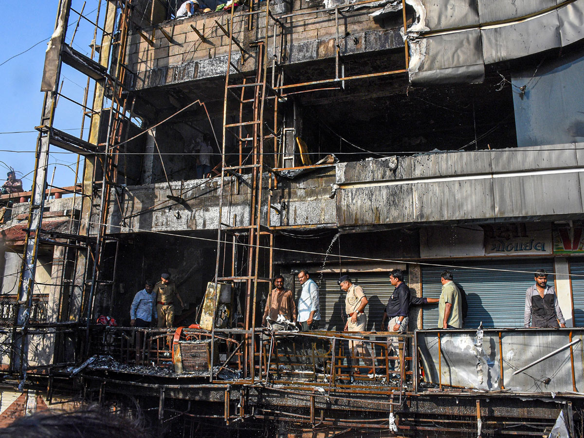 Fire Accident Taxshila Complex in Surat Photo Gallery - Sakshi11