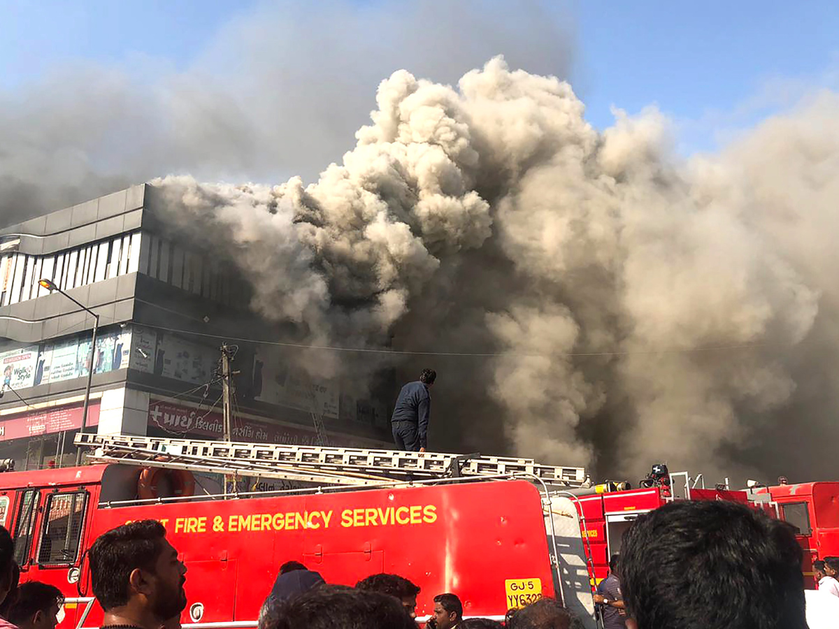 Fire Accident Taxshila Complex in Surat Photo Gallery - Sakshi3