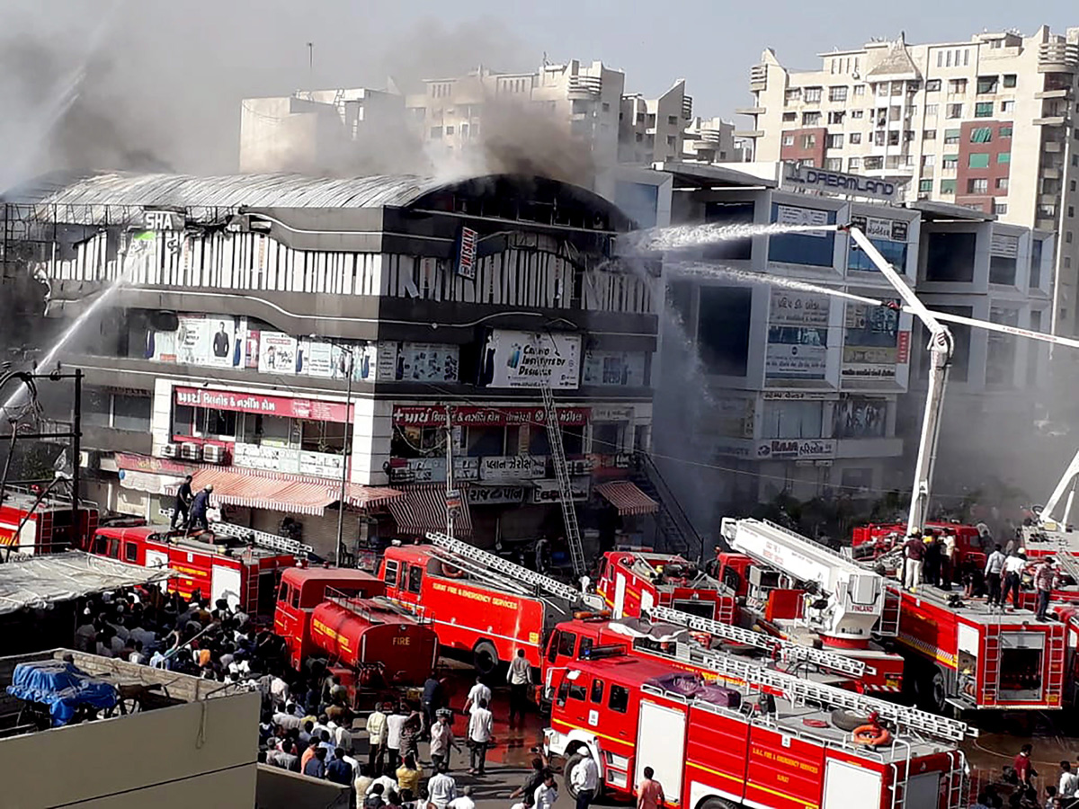 Fire Accident Taxshila Complex in Surat Photo Gallery - Sakshi4