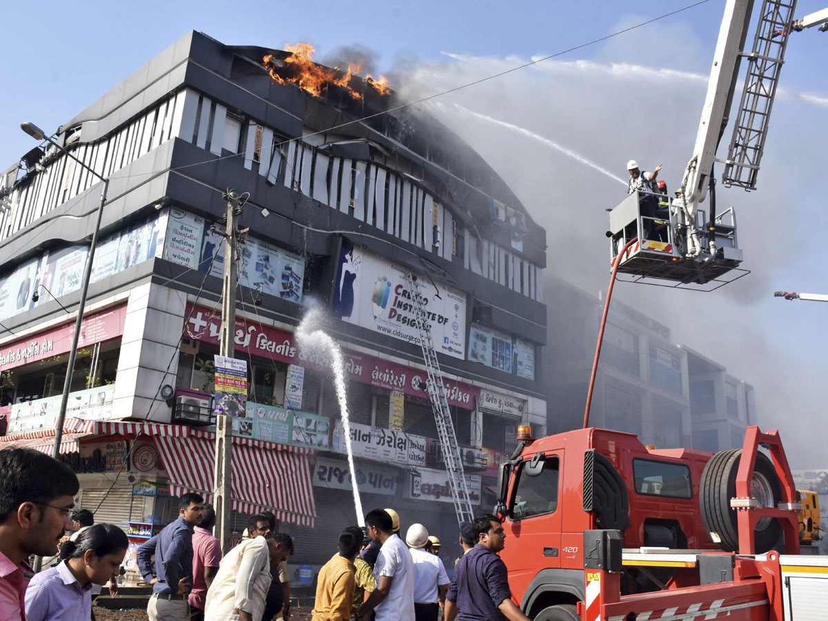 Fire Accident Taxshila Complex in Surat Photo Gallery - Sakshi8