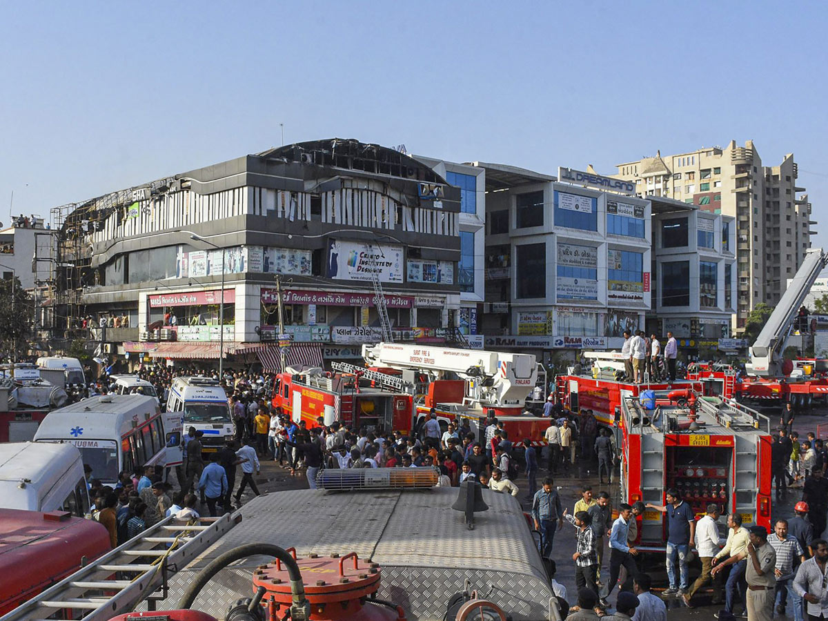 Fire Accident Taxshila Complex in Surat Photo Gallery - Sakshi9