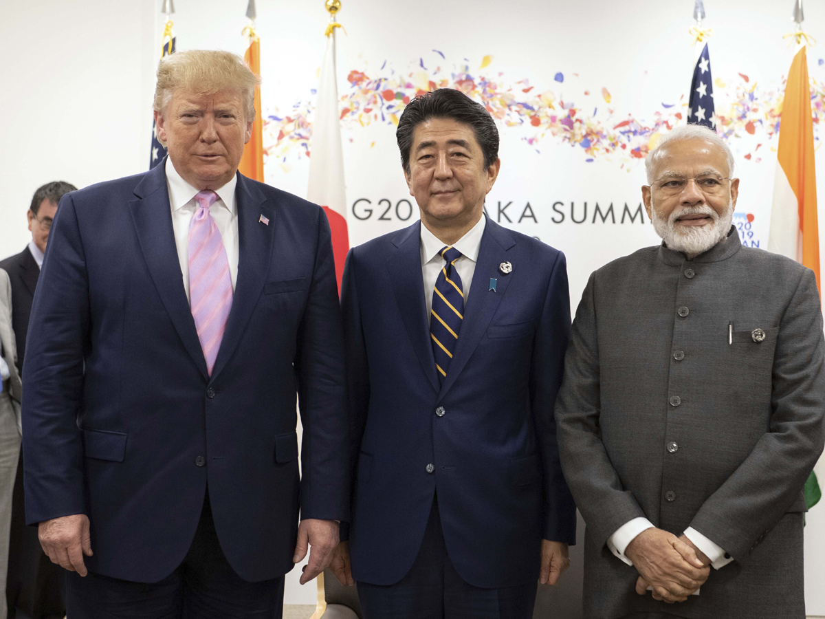 PM Modi holds trilateral meeting with Trump Photo Gallery - Sakshi5