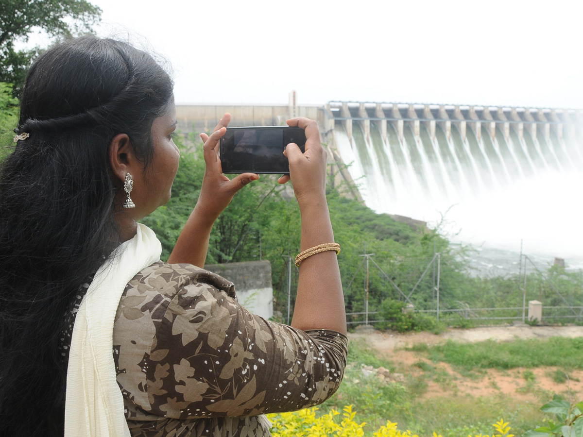 All 26 Gates Lifted at Nagarjuna Sagar Dam Photo Gallery - Sakshi25