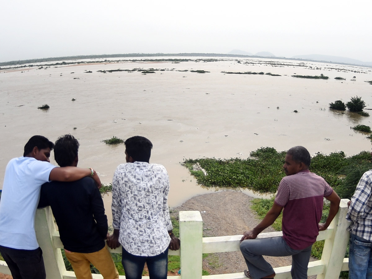 Record Level Flood Water Reaches Prakasam Barrage Photo Gallery - Sakshi12