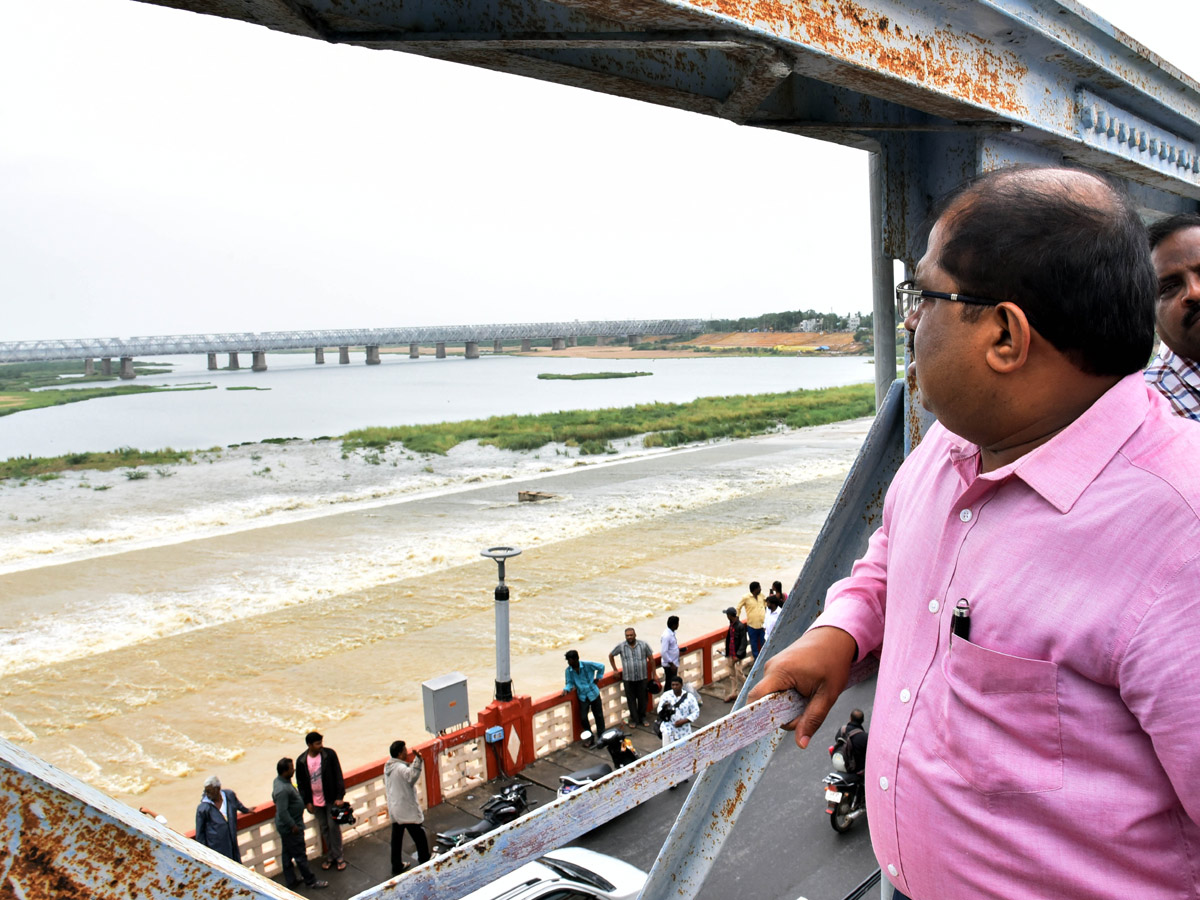 Record Level Flood Water Reaches Prakasam Barrage Photo Gallery - Sakshi13