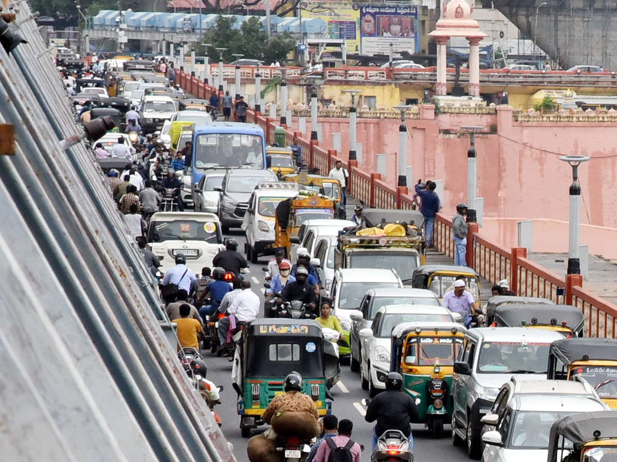 Record Level Flood Water Reaches Prakasam Barrage Photo Gallery - Sakshi18