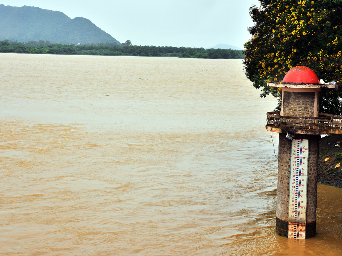 Record Level Flood Water Reaches Prakasam Barrage Photo Gallery - Sakshi22