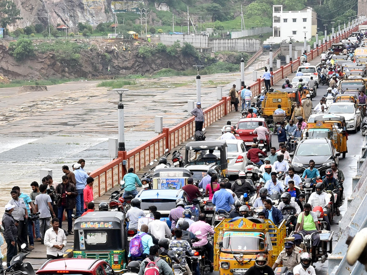 Record Level Flood Water Reaches Prakasam Barrage Photo Gallery - Sakshi8