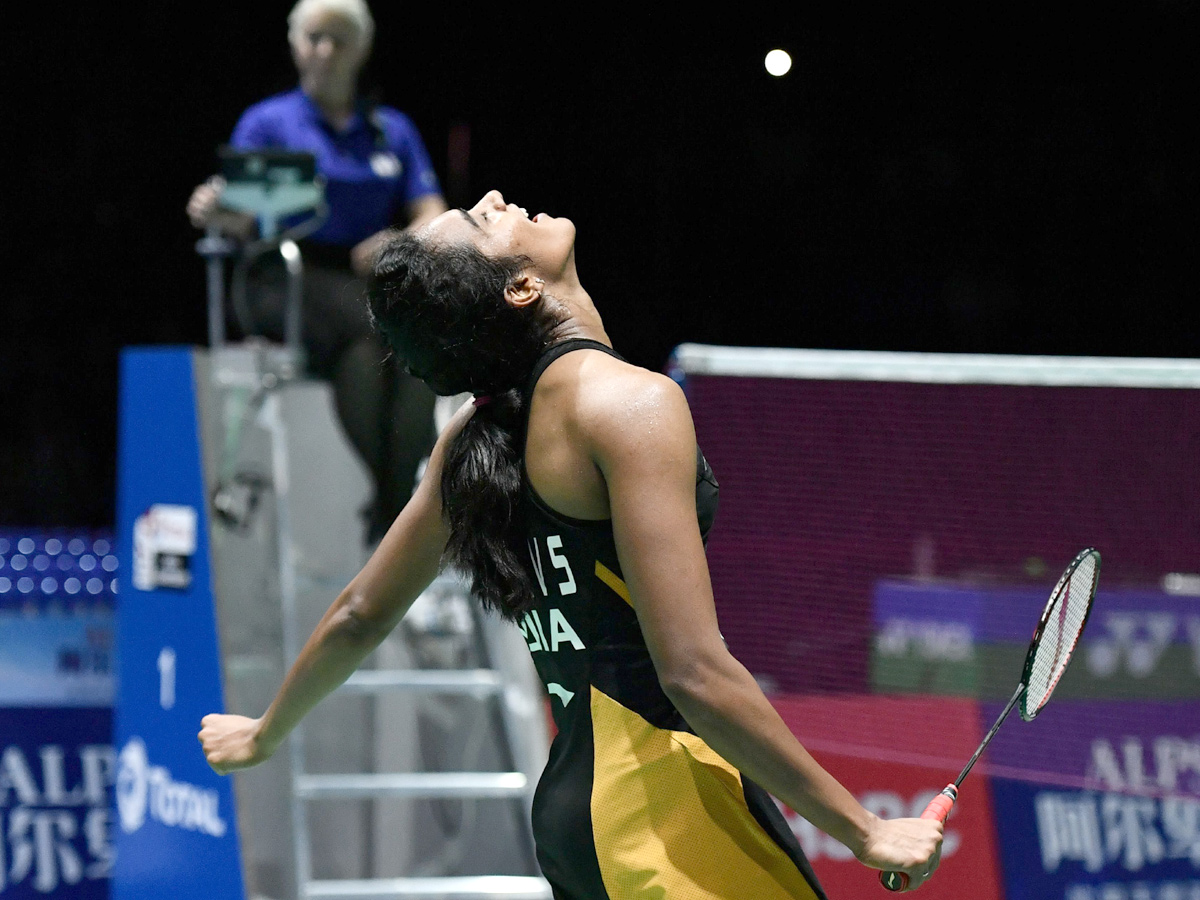 P V Sindhu Becomes First Indian To Clinch Badminton World Championships Gold - Sakshi3