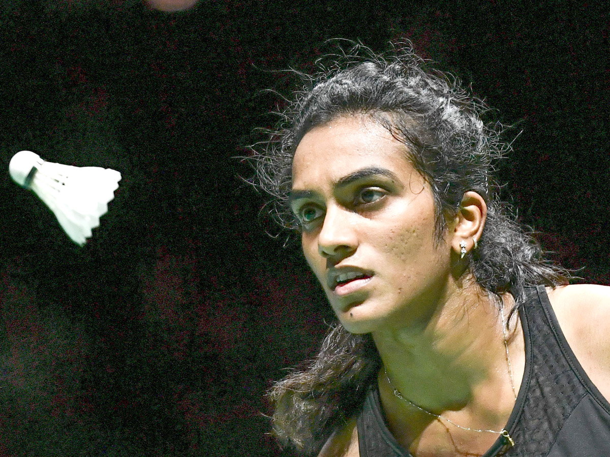 P V Sindhu Becomes First Indian To Clinch Badminton World Championships Gold - Sakshi14