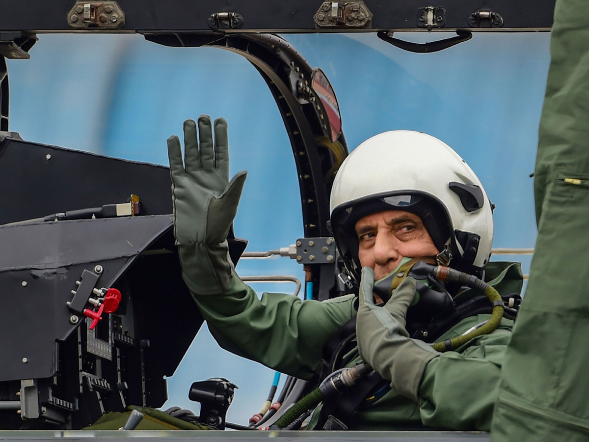 Rajnath Singh becomes fly in light combat aircraft Tejas Photo Gallery - Sakshi1