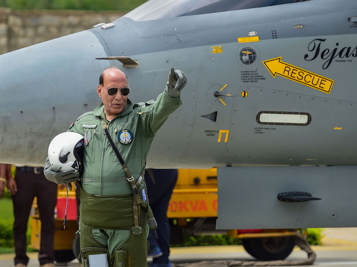 Rajnath Singh becomes fly in light combat aircraft Tejas Photo Gallery - Sakshi2