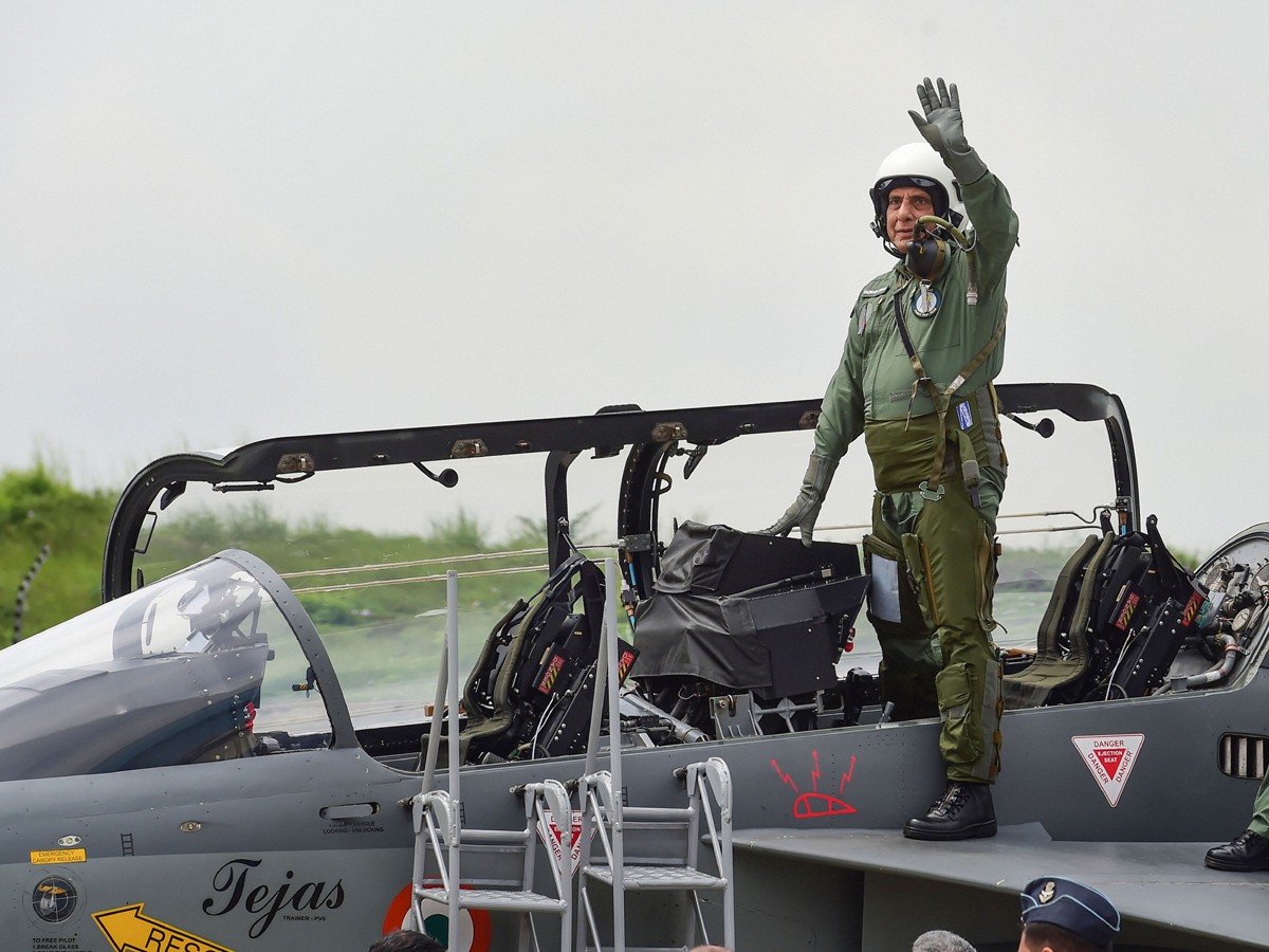 Rajnath Singh becomes fly in light combat aircraft Tejas Photo Gallery - Sakshi11