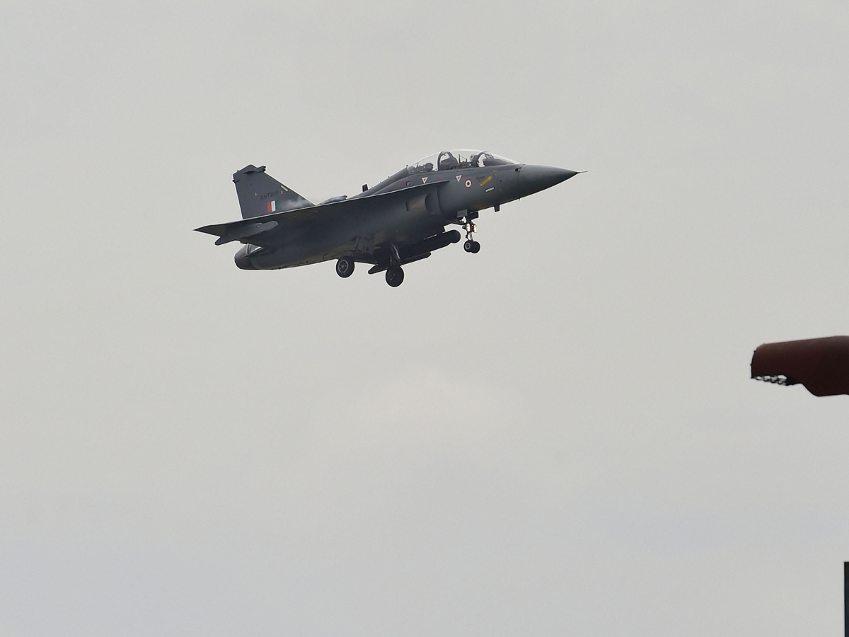 Rajnath Singh becomes fly in light combat aircraft Tejas Photo Gallery - Sakshi12