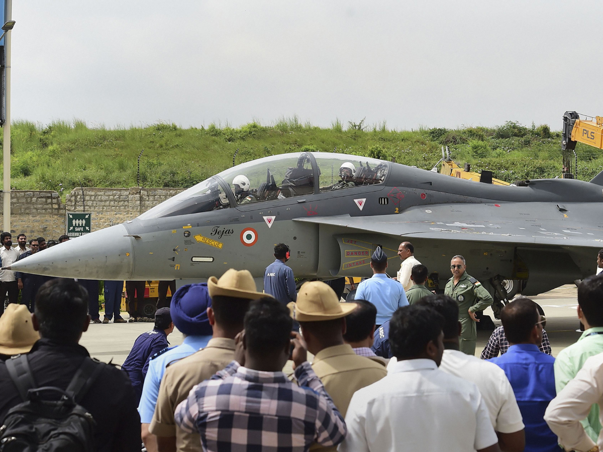 Rajnath Singh becomes fly in light combat aircraft Tejas Photo Gallery - Sakshi13