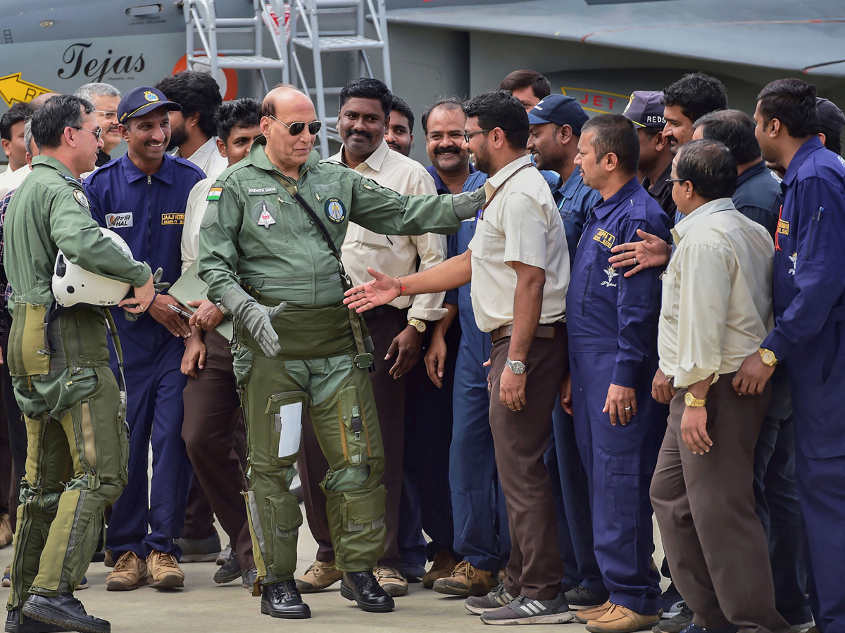 Rajnath Singh becomes fly in light combat aircraft Tejas Photo Gallery - Sakshi14