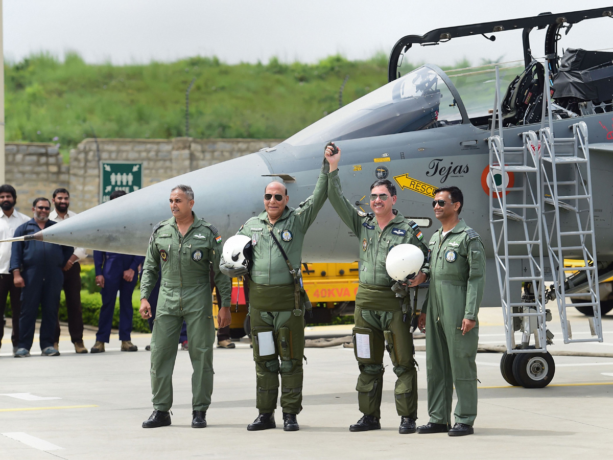 Rajnath Singh becomes fly in light combat aircraft Tejas Photo Gallery - Sakshi16