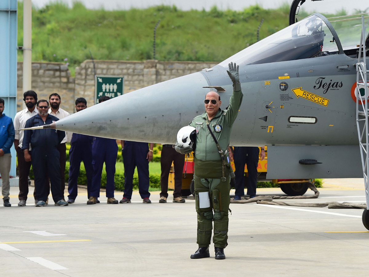 Rajnath Singh becomes fly in light combat aircraft Tejas Photo Gallery - Sakshi17