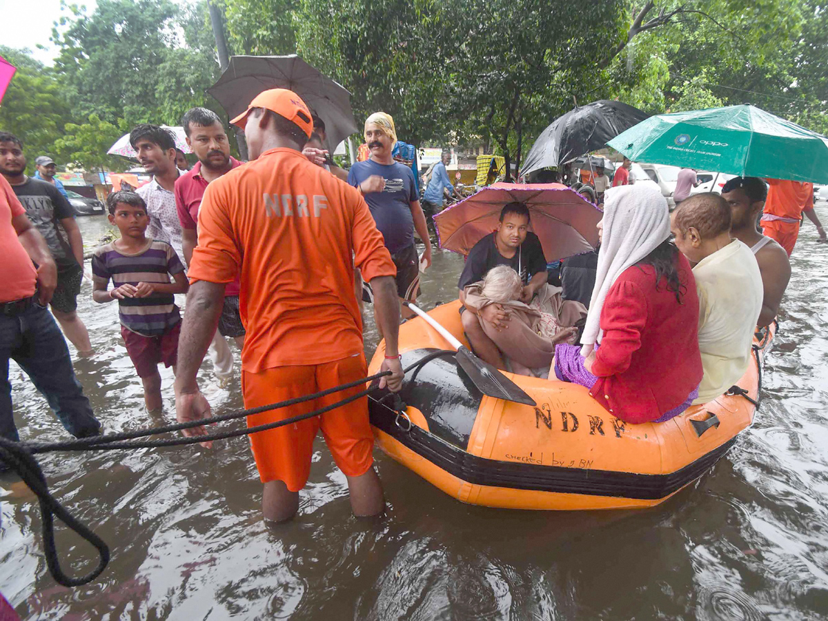 Rain wreaks havoc in Bihar alert in 13 districts Photo Gallery - Sakshi9