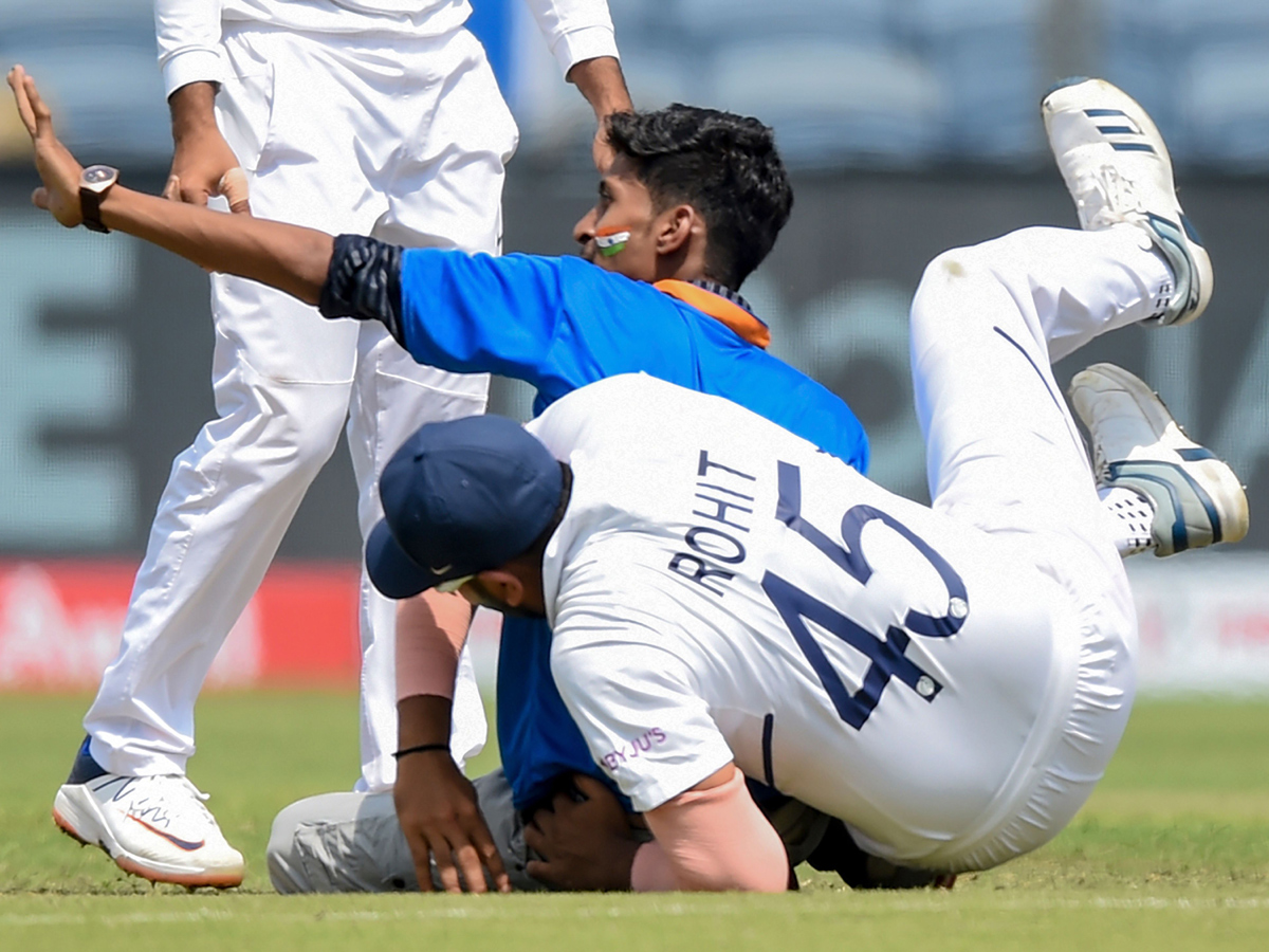 Fan Who Ran Towards The Meet Indian Batsman Rohit Sharma - Sakshi12