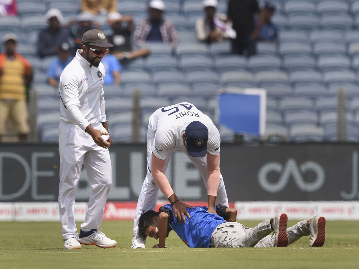 Fan Who Ran Towards The Meet Indian Batsman Rohit Sharma - Sakshi4