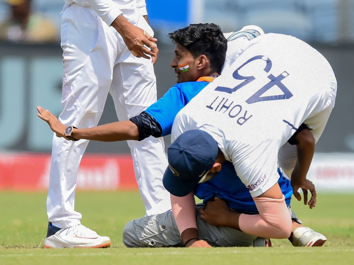 Fan Who Ran Towards The Meet Indian Batsman Rohit Sharma - Sakshi5