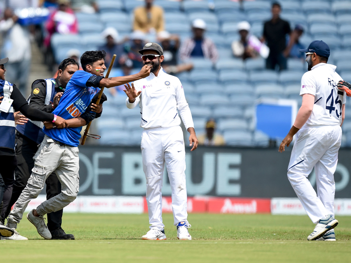 Fan Who Ran Towards The Meet Indian Batsman Rohit Sharma - Sakshi9