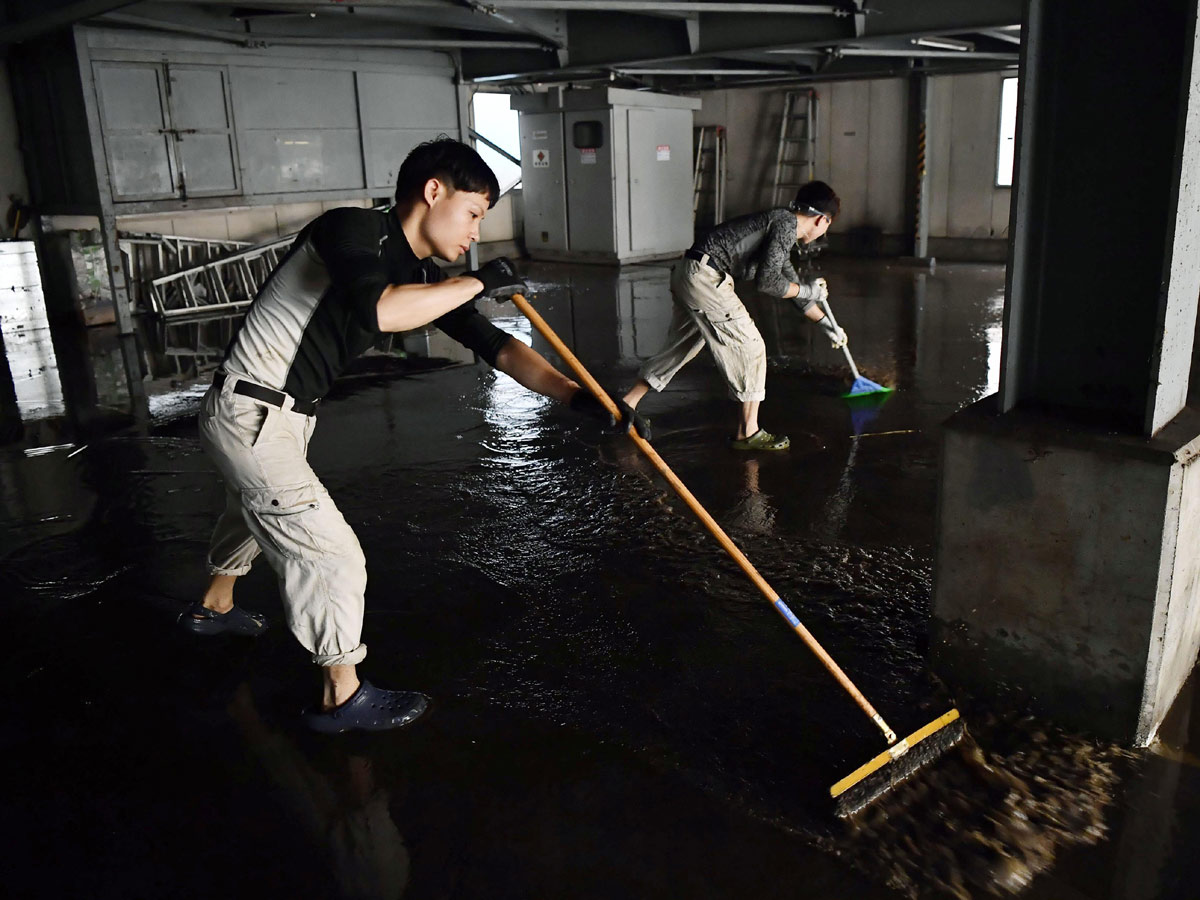 Japan Begins Clean Up After Typhoon Photo Gallery - Sakshi13