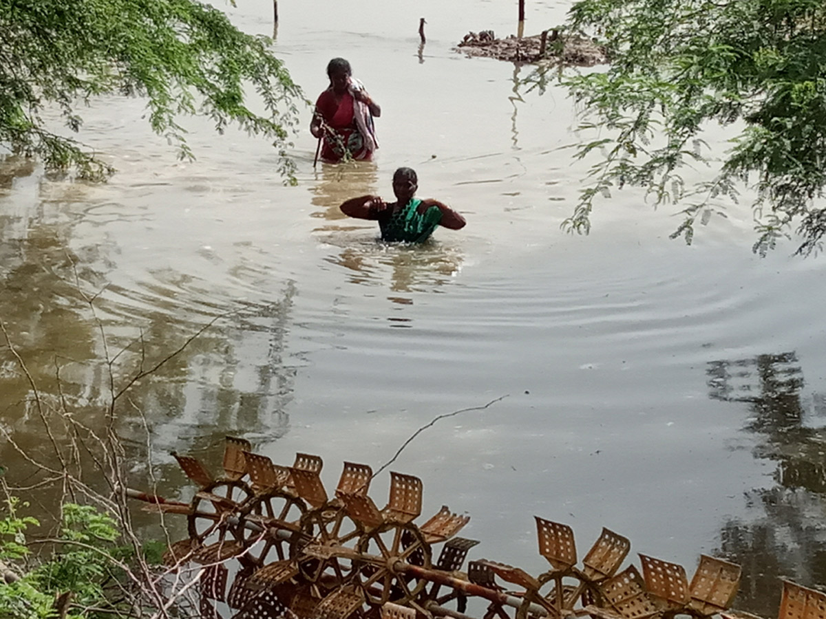 Heavy Flood Water Reaches Godavari and Krishna Rivers Photo Gallery - Sakshi11