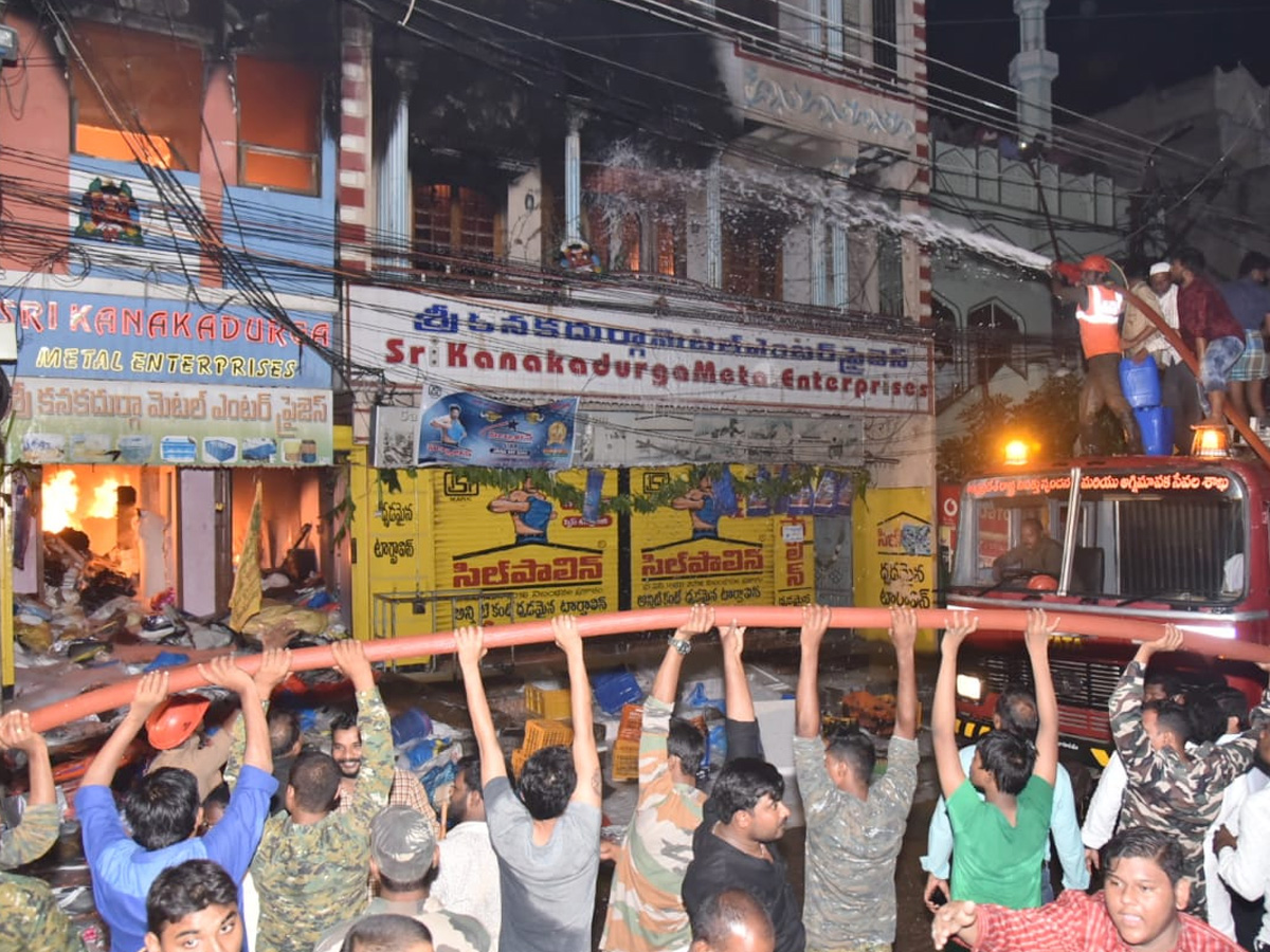 Nellore Chinna bazar fire Accident PHoto Gallery - Sakshi13