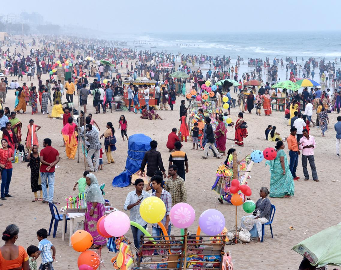 Public Enjoy In Rk Beach At Visakhapatnam - Sakshi12