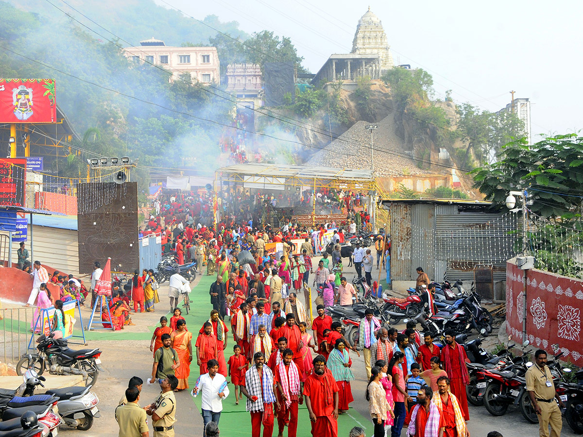 Bhavani Deeksha Maladharana begins in Vijayawada Photo Gallery - Sakshi10