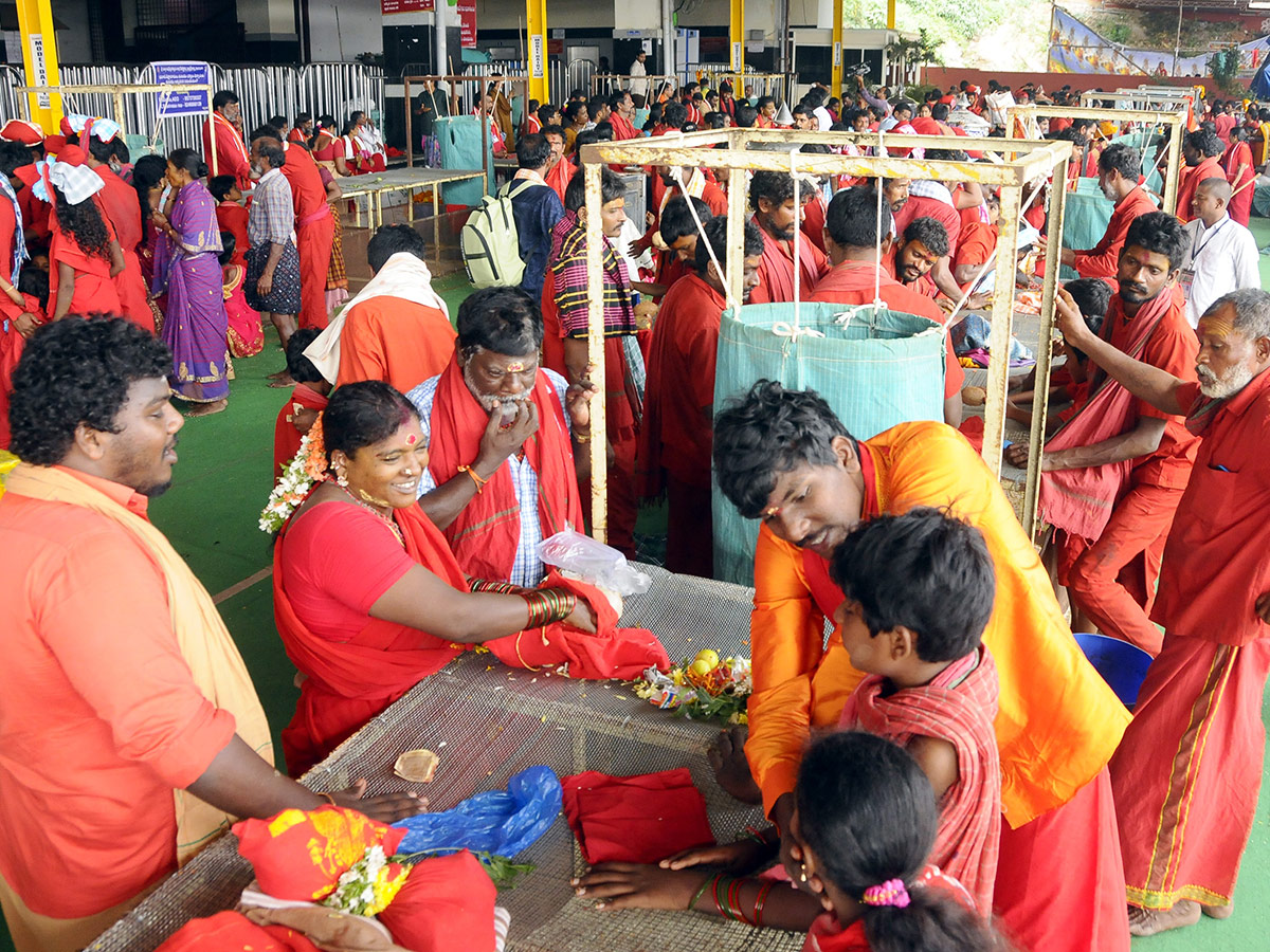 Bhavani Deeksha Maladharana begins in Vijayawada Photo Gallery - Sakshi11