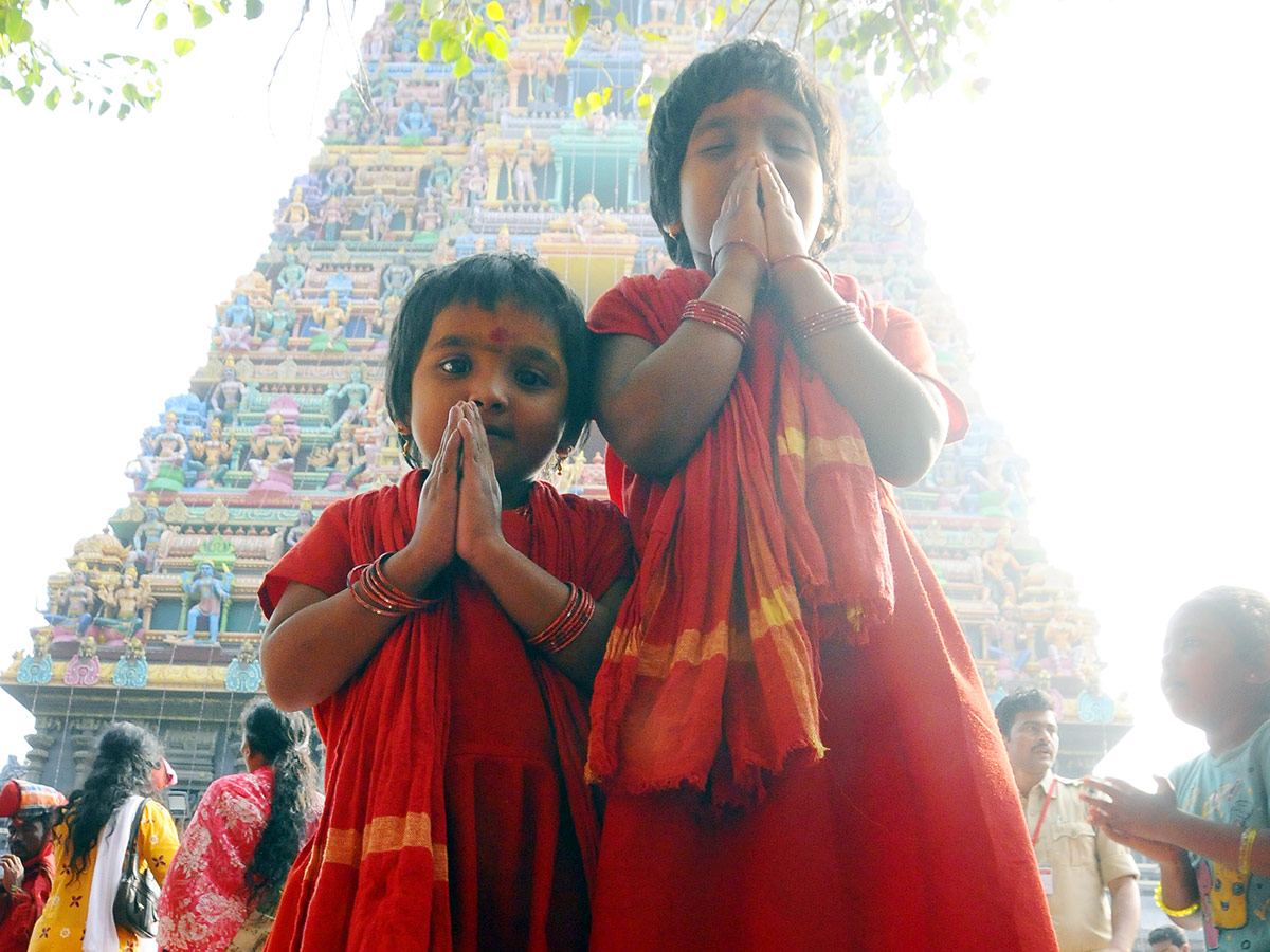 Bhavani Deeksha Maladharana begins in Vijayawada Photo Gallery - Sakshi13