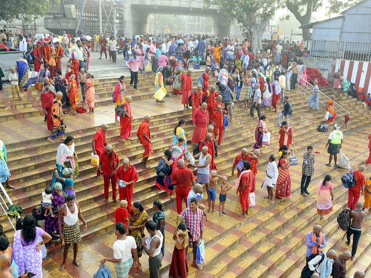 Bhavani Deeksha Maladharana begins in Vijayawada Photo Gallery - Sakshi14