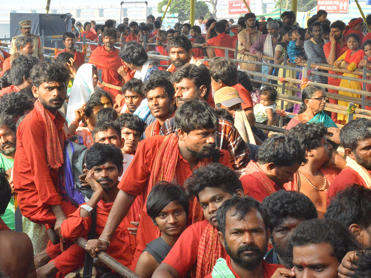 Bhavani Deeksha Maladharana begins in Vijayawada Photo Gallery - Sakshi16