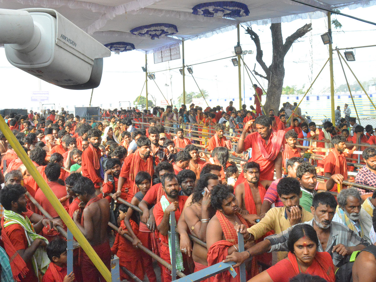 Bhavani Deeksha Maladharana begins in Vijayawada Photo Gallery - Sakshi18