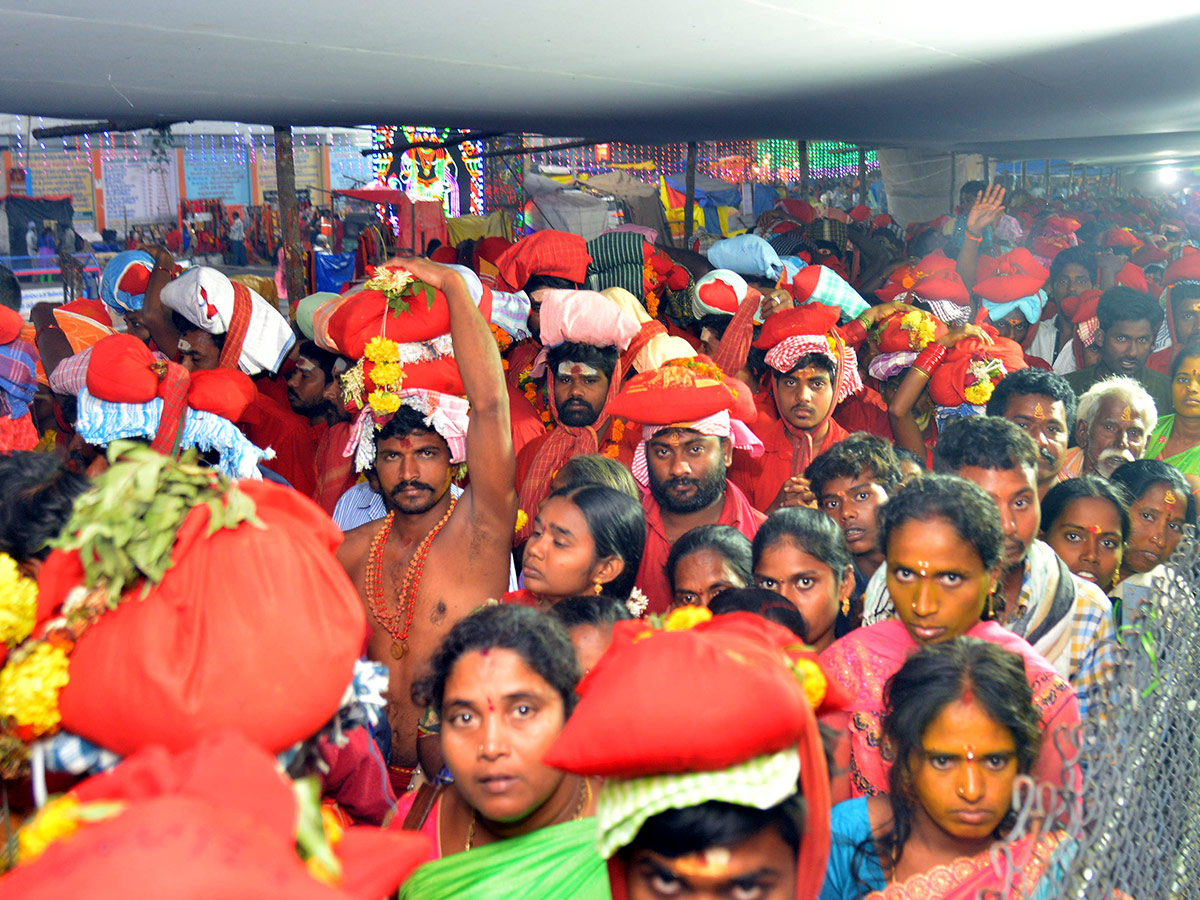 Bhavani Deeksha Maladharana begins in Vijayawada Photo Gallery - Sakshi24