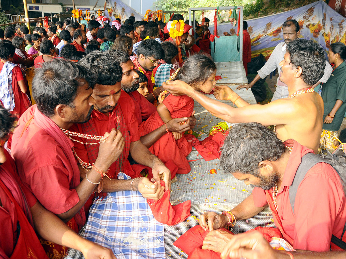 Bhavani Deeksha Maladharana begins in Vijayawada Photo Gallery - Sakshi29