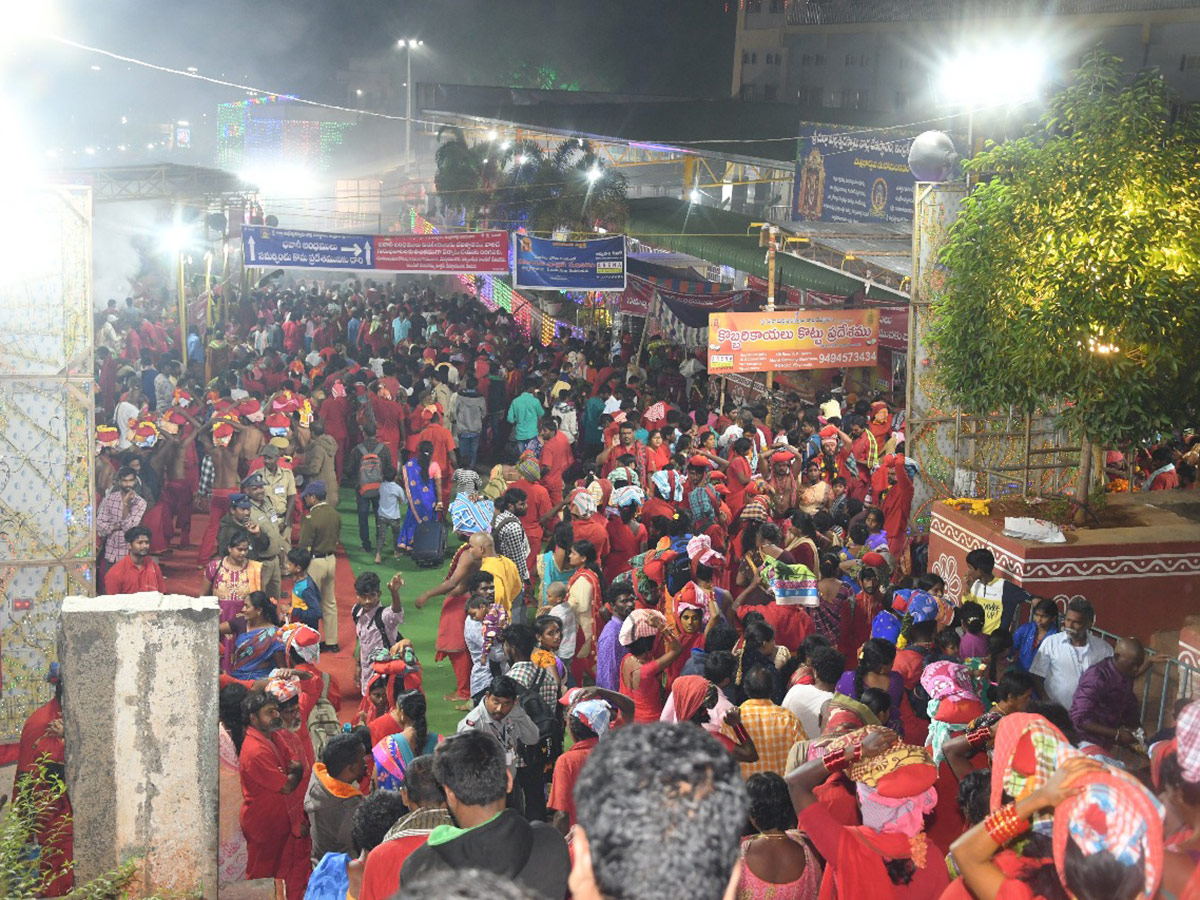 Bhavani Deeksha Maladharana begins in Vijayawada Photo Gallery - Sakshi37