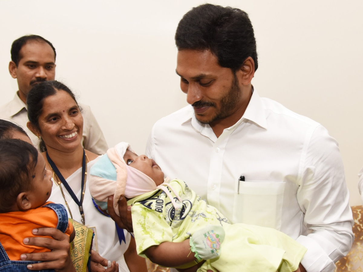 CM YS Jagan Gives Polio Drops To A Child In Camp Office - Sakshi11