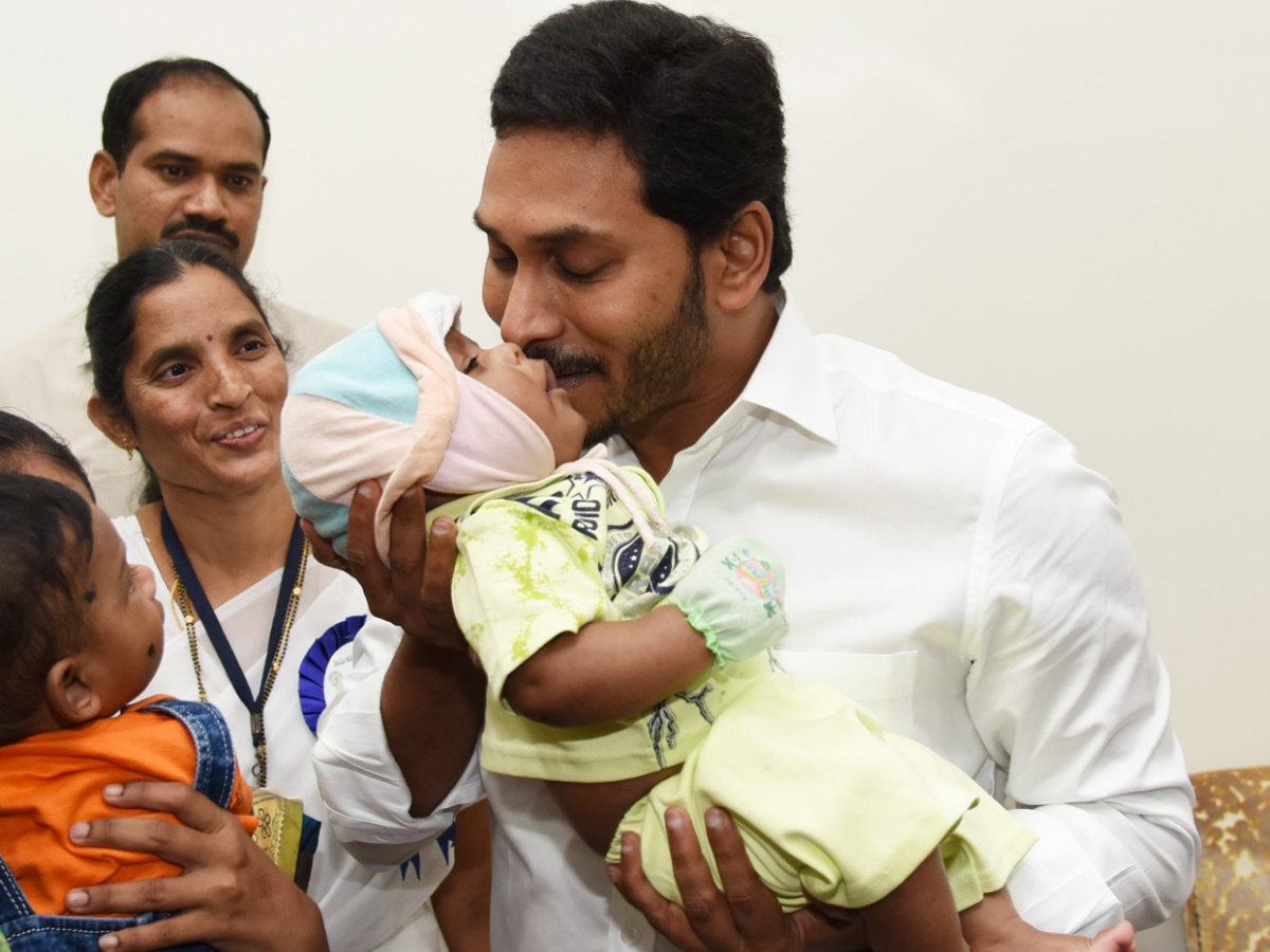 CM YS Jagan Gives Polio Drops To A Child In Camp Office - Sakshi13