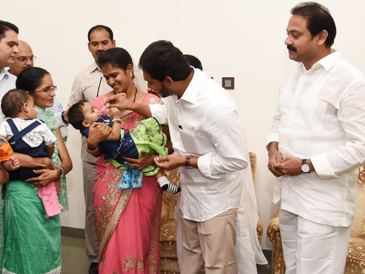 CM YS Jagan Gives Polio Drops To A Child In Camp Office - Sakshi14