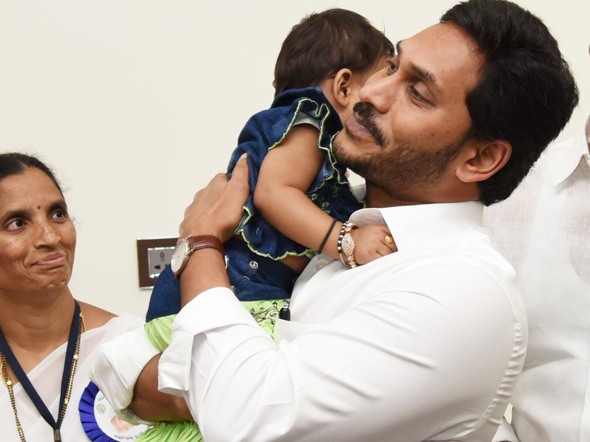 CM YS Jagan Gives Polio Drops To A Child In Camp Office - Sakshi4