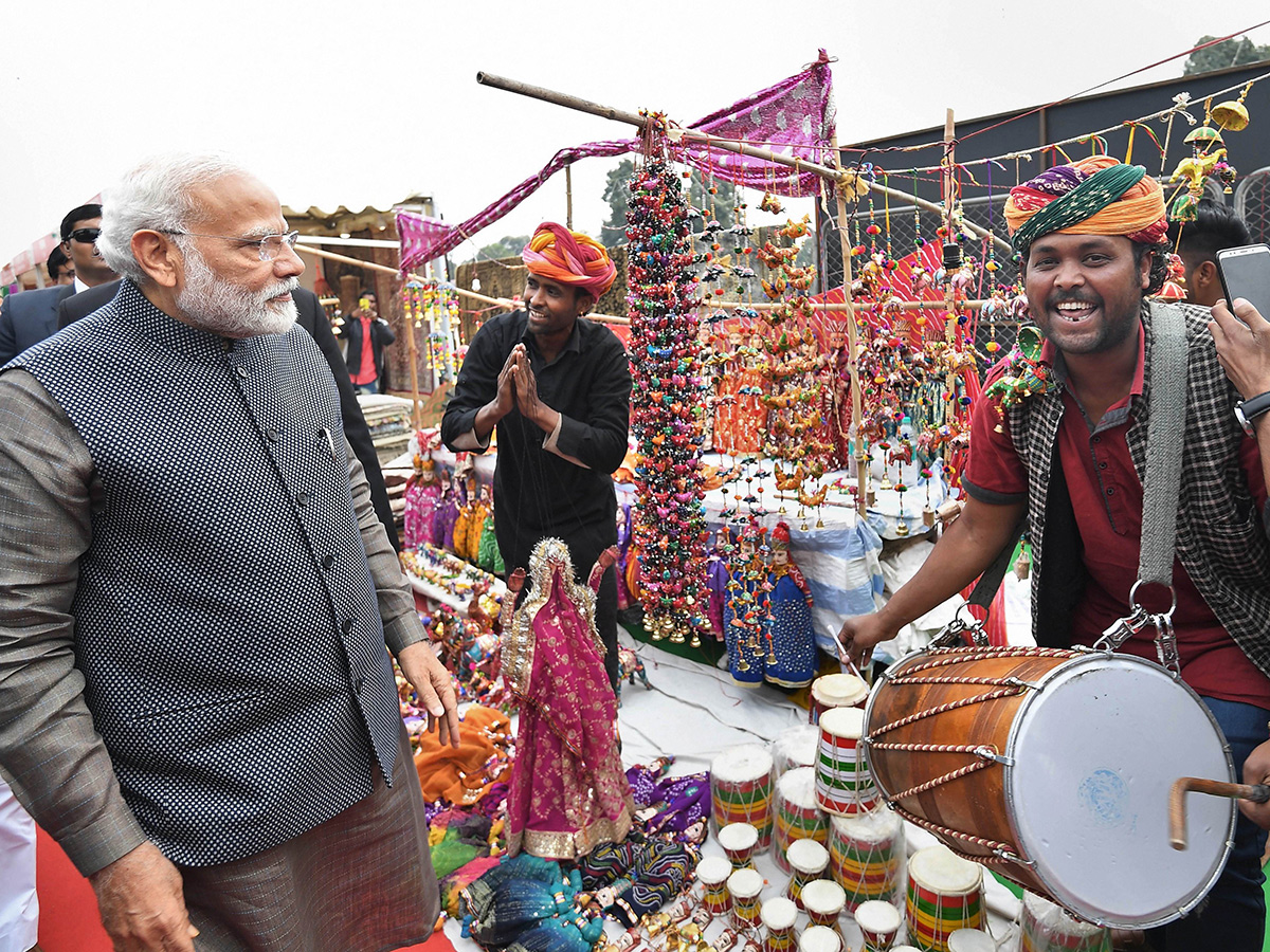 PM Narendra Modi Visits Artisans Fair Hunar Haat in New Delhi Photo Gallery - Sakshi10