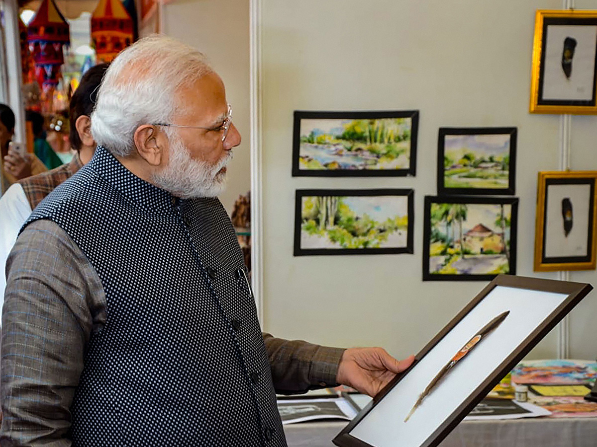 PM Narendra Modi Visits Artisans Fair Hunar Haat in New Delhi Photo Gallery - Sakshi3