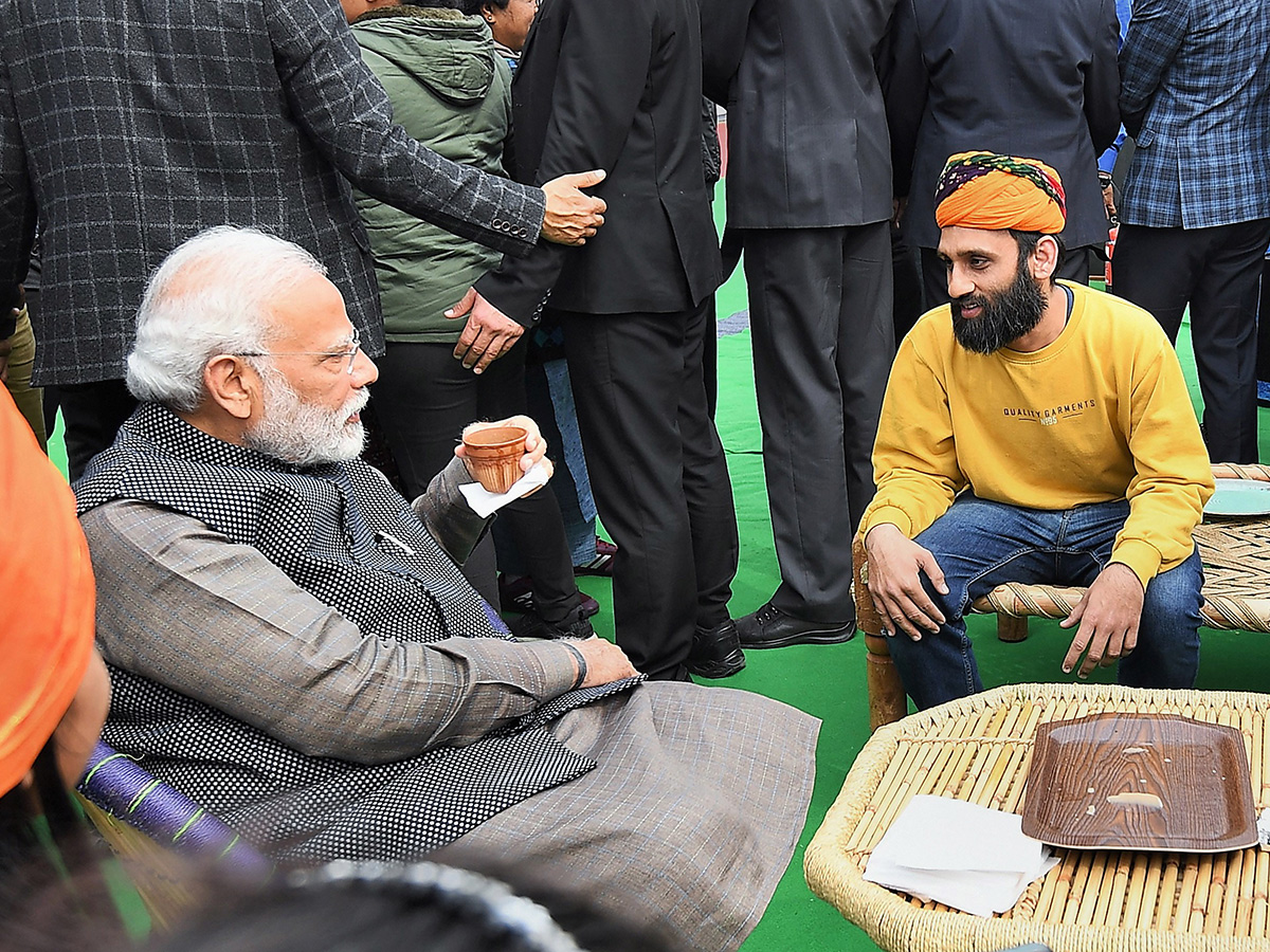 PM Narendra Modi Visits Artisans Fair Hunar Haat in New Delhi Photo Gallery - Sakshi9