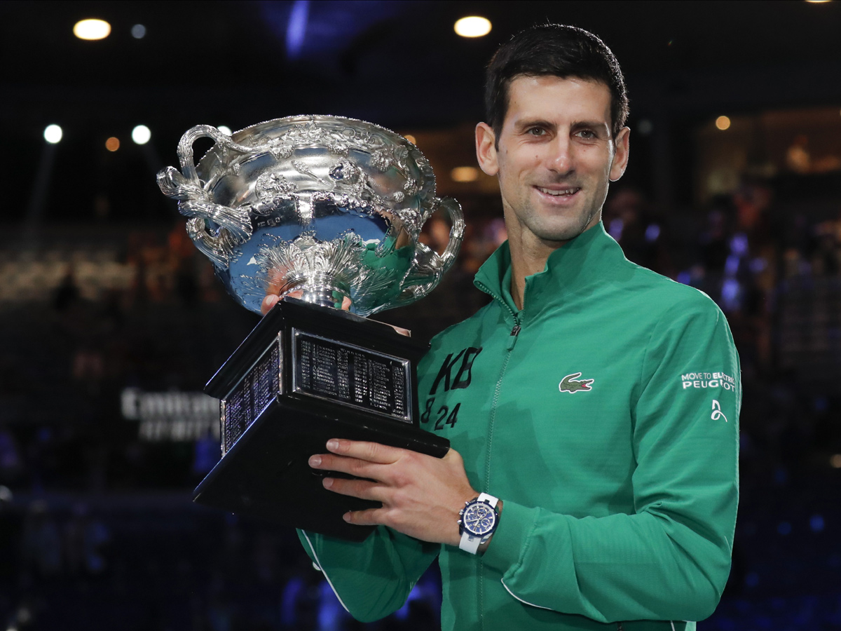 Novak Djokovic Beats Dominic Thiem To Clinch 8th Title Photo Gallery - Sakshi1